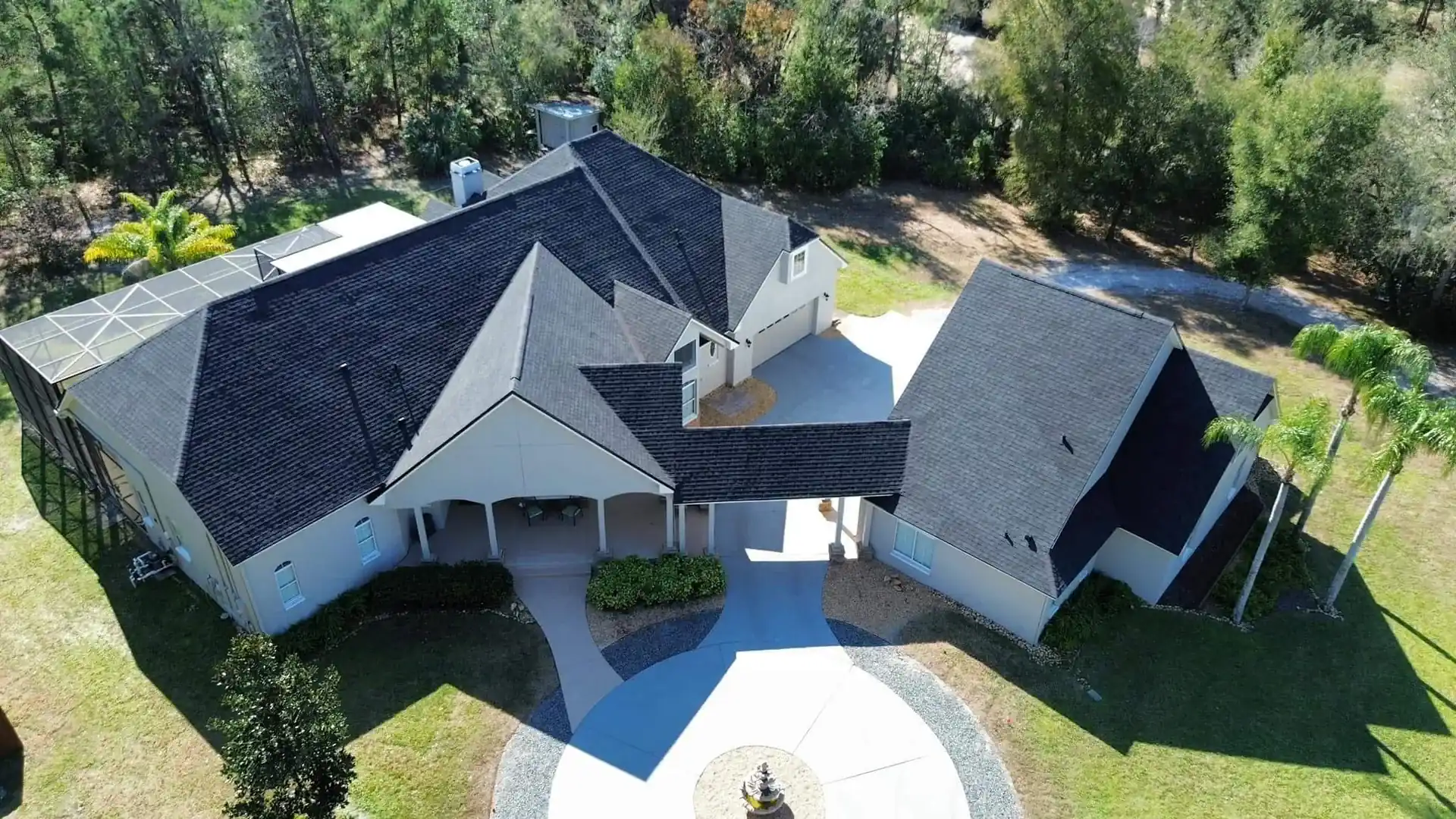 Dark architectural shingle roof on a Sanford home, replaced by Adcock Roofing