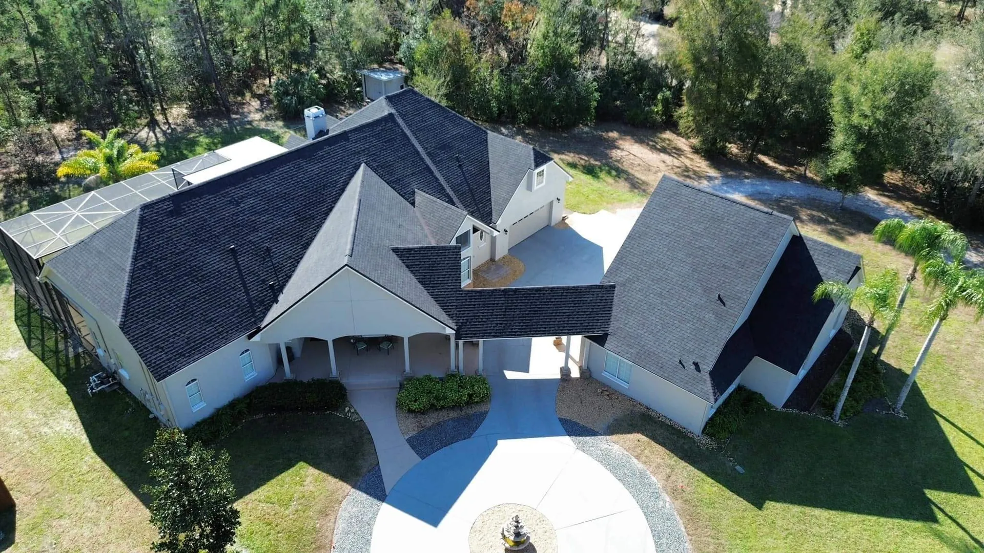 Dark architectural shingle roof on a Sanford home, replaced by Adcock Roofing